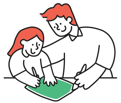 Smiling adult and child with red hair kneel together, drawing on a green sheet of paper; playful, warm, collaborative mood.
