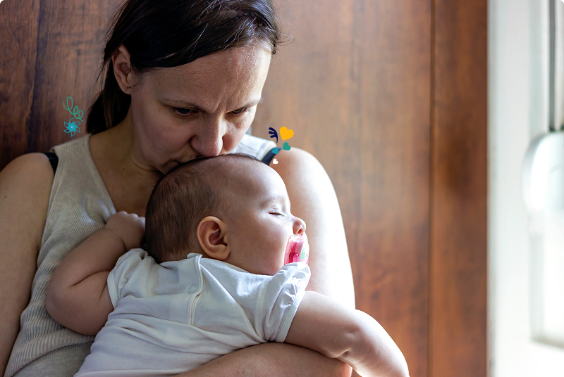Mom holding baby