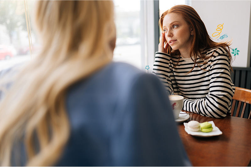Two women talking to each other